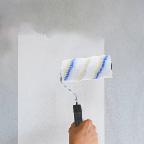Top Shelf Three Piece Paint Roller Brush Set With Comfort Grip Handle And Ultra Soft Protective Bristles painting a wall.