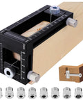 2-in-1 Auto Centering Dowel Drilling Jig With 8 Drill Bushings 3-10mm mounted on wood, showing precision scale and adjustable knobs.