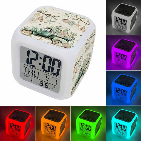 Reliable Digital Alarm Clock With Rustic Green Leaf Motif Lowkey Silent Operation Quiet Bedside Timer Featuring Comfy Silicone Keys Straight Up Easy Snooze Mode With Warm Led Nightlight For Bedroom Or Desk with illuminated LED display.
