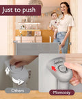 Woman with baby demonstrating Retractable Baby Gate For Stairs And Doorways, 33 Inch Tall, Expands To 55 Inch Wide, Double Locking Safety.