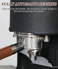 Close-up of Straight Up Automatic Espresso Tamper 58mm Coffee Press with sensor and portafilter in use.