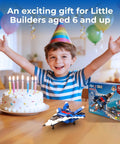 Child with birthday cake and 12-In-1 STEM Building Blocks Kit Ages 4 To 8 139 Pieces Fighter Jet Model, smiling and joyful