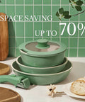 Stacked Nonstick Ceramic Cookware Set Eight Piece With Detachable Handle Induction Ready Pots and Pans, Forest Green, on counter