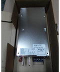 Rock Solid Din Rail Switching Power Supply 1000W 24V DC with metal casing in a cardboard box, perfect for automation systems.