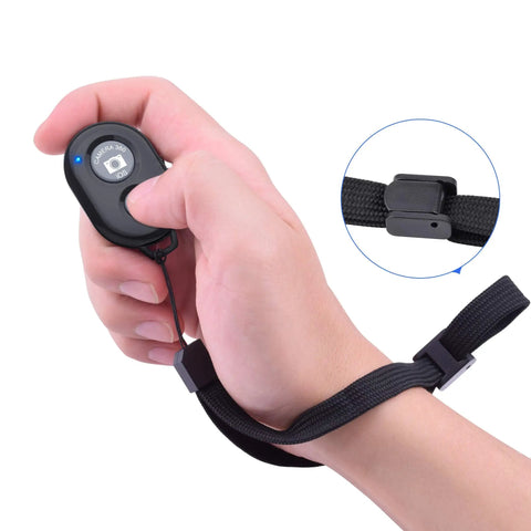 Two Pack Wireless Phone Camera Remote Shutter For iPhone And Android with strap in hand, hands free selfie button close-up