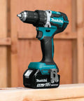 Top Shelf Compact 18V LXT Brushless Cordless Driver Drill Kit With 5Ah Lithium Battery, highlighting handle and battery.