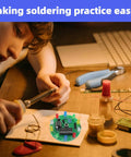 Two Pack Soldering Practice Kit With CD4017 And NE555 Chips in use by student, featuring Lucky Wheel LED Light Project board