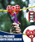 Zipline Pulley 25KN Aluminum Alloy Trolley With Stainless Steel Bearings for Smooth Glide, depicted installed on a yellow cable