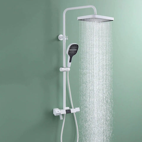 Wall Mounted Exposed Shower System 3 Functions Chrome with rainfall showerhead and handheld sprayer on green wall.