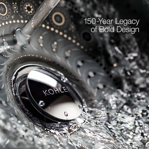 Close-up of Kohler faucet with intricate design and water flow, showcasing Purist Single Function Showerhead With Katalyst Air Induction Technology.
