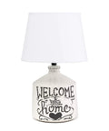 Welcome Home Rustic Ceramic Farmhouse Table Lamp With White Linen Shade, White Wash Ridged Base decorated with 'Welcome to our home'.