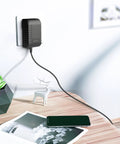 AC Adapter For Roland FP-10 Digital Piano Charger Power Supply Cord plugged into wall, sleek design, black color