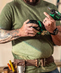 Person holding 18V MultiVolt Cordless Brushless Impact Driver from Combo Kit for Framing and Finishing with Compact Design