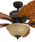 Close-up of Sabal Palm 52 Inch Tropical LED Ceiling Fan with Light, hand carved solid wood blades, bronze finish, pull chain view