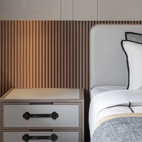 Nightstand with Vintage Metal Drawer Pulls Three Piece Set, Rustic Black Alloy Cabinet Handles, next to a bed.