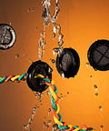 Top Shelf Rubber Grommet Plugs 15 Piece Set Keeps Cable Wiring Slick And Secure 1 Inch Inner Diameter showcasing black grommets with water spray.