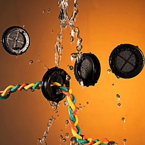 Top Shelf Rubber Grommet Plugs 15 Piece Set Keeps Cable Wiring Slick And Secure 1 Inch Inner Diameter showcasing black grommets with water spray.