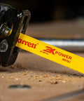 Bi-Metal Reciprocating Blade For Fast Cut General Purpose Use, 0.035 Inch Thick, 18 TPI, inserted in saw, close-up view