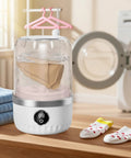 Compact Portable Washing Machine For Travelers And Students Slick Laundry Appliance offering hassle free plug and play operation in a cozy laundry space.
