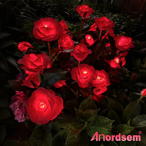 Solar Garden Lights Outdoor 10 Waterproof Fabric Roses 2 Pack Rad Red Led Flower Decorations glowing red in garden at night