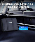 Car trunk with Level 1 And 2 Portable Home EV Charger With 16Amp 110V To 240V Flex in a case, emphasizing easy storage.