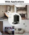 Stainless Steel Magnetic Door Stopper With Retractable Catch For Easy Open No Drill Or 3M Adhesive Install Screws Included Fits Gaps Up To One Point Four Inches Keeps Doors Open Securely Black Finish 1 Pack in various room settings.