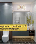 Sunburst Brushed Nickel Wall Sconces, 2 Light Mid Century Modern Vanity Lights above bathroom mirror with modern decor.