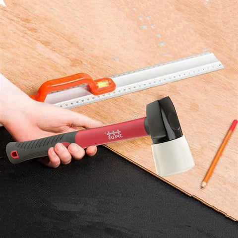 Person holding Fiberglass Handled Replacement Flooring Mallet For Flooring Nailers And Staplers with ruler and pencil nearby