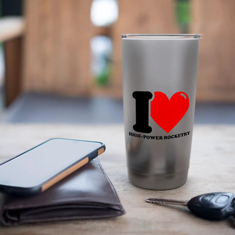 I Heart High Power Rocketry Stainless Steel Insulated Tumbler with clear slider lid, shown on a table with phone and keys.