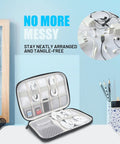 Open Ultimate Travel Cable Organizer Bag With Double Layer Tech Pouch showing cords and accessories neatly arranged.