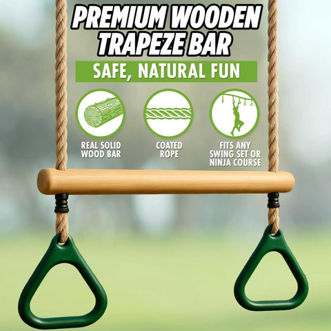 Kids Trapeze Bar With 18 Inch Adjustable Height And Gym Rings For Swing Sets Ninja Warrior Obstacle Course Jungle Gym Playground Attachments Durable Easy Install Backyard Fun with wooden bar and green rings.