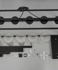 Black Farmhouse Style 5-Light Rectangle Chandelier With Glass Shades components, visible frame and parts on display