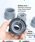 Hand holding hollow-core tool from Camera Lens Repair Tool Kit For DSLR And Vintage Lenses With 9 Piece Rubber Ring Remover And Filter Wrench Set