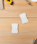 Two pieces of the Silicone Sealing Gasket Set With Wave Sleeves, 4 Piece Replacement Kit For Ice Cream Makers on a wooden table.
