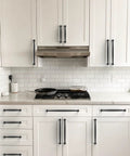 Modern kitchen with Matte Black Cabinet Pulls 10 Pack 5 Inch 128mm Solid Zinc Alloy Kitchen Handles installed on white cabinets