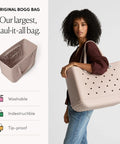 Original Large Tote Bag That Is Durable, Washable, And Tip-Proof For Beach, Pool, Boat, Work, And Sports, Mushroom Color carried by model