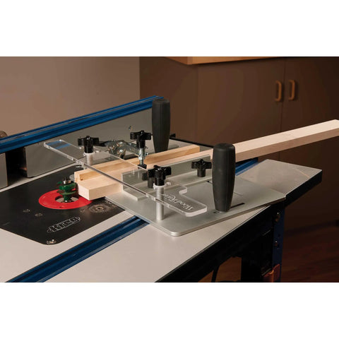 Router Table Coping Sled Kit With Sacrificial Backing Board And Adjustable Fence Guide Spacers in use on a router table