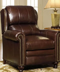 Top Shelf Solid Brass Tacks For Furniture Fixes Killer Retro Upholstery Nails used on a brown leather chair with brass studs.