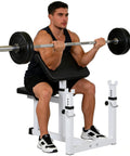 Man using Preacher Curl Bench Adjustable Arm Curl Bench for Bicep Isolation Home Gym Strength Training with barbell.