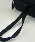 Close-up of the sturdy handle on a Tesla NACS To CCS1 Adapter Storage Case Eva Nylon Protective Gear Bag.