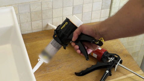 Using Anti Drip Caulking Gun Kit 3 Pack Ultra Lightweight ABS Frame for sealing around a sink in kitchen