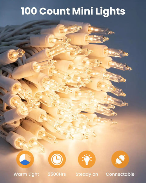 Clear Christmas Lights Set With 100 Mini Bulbs On White Wire 20 Feet Incandescent String Lights glowing warmly