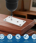 Kickass Stainless Steel Mending Plates 20 Piece Set With Pre Drilled Screws shown during installation on wooden furniture.