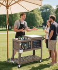 80 Quart Rolling Patio Cooler With Bottle Opener And Shelf Standing Ice Chest With Blackboard For Outdoor Gatherings in use