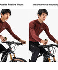 Cyclist using Dope Nylon MTB Inner Bar Ends for Mountain Bikes with Cap Pack and Wrench, ergonomic handlebar ends in two mounting positions.