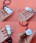 12V DC Mini Food Grade Self Priming Diaphragm Water Transfer Pump One Point Three Liters Per Minute in hand close-up