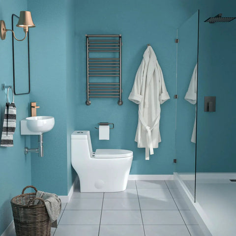 Modern bathroom with blue walls, wall-mounted sink, white robe, and glass shower.