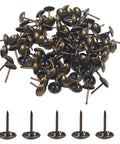 Top Shelf Pro Pack 11mm Round Head 17mm Pin Upholstery Tacks Bronze Decorative Furniture Nails Thumbtacks scattered on white