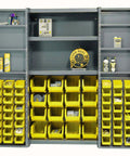 Heavy Duty Swinging Door Parts Bin Cabinet With 64 Yellow Plastic Bins And Adjustable Interior Door Shelves To Rack Up Parts Fast And Make The Whole Shop Setup Look Fly with organized bins and shelves.