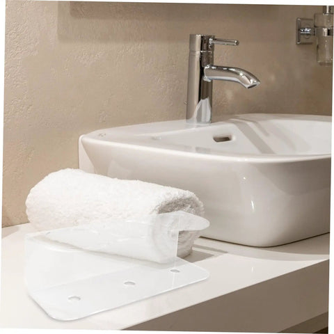 Wall Mounted Spray Bottle Holder Knocks The Mess Out Of Your Bathroom Or Garage With Heavy Duty Acrylic Design displayed next to a rolled towel.